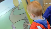 Image of children using a Sharp Interactive Touchscreen Table