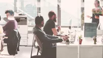 Group-of-people-working-at-office-by-printer-copier