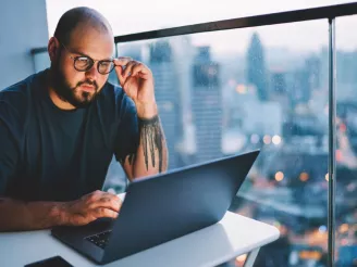 man working at computer