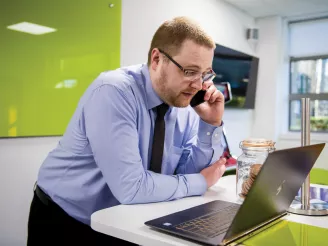 Man providing outsourced IT support