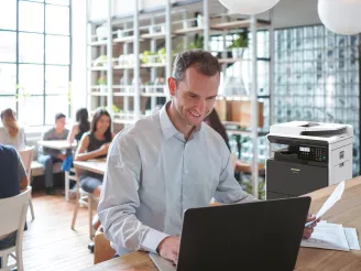 Entrepreneur typing on laptop