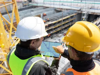 Construction Workers Looking at Ipad