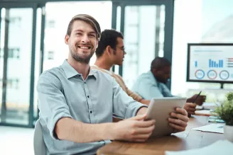 Man using iPad in office