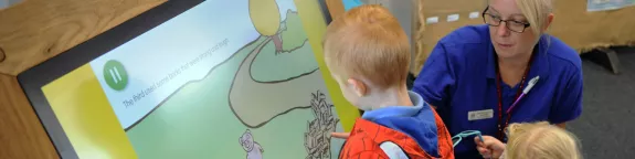 Image of children using a Sharp Interactive Touchscreen Table