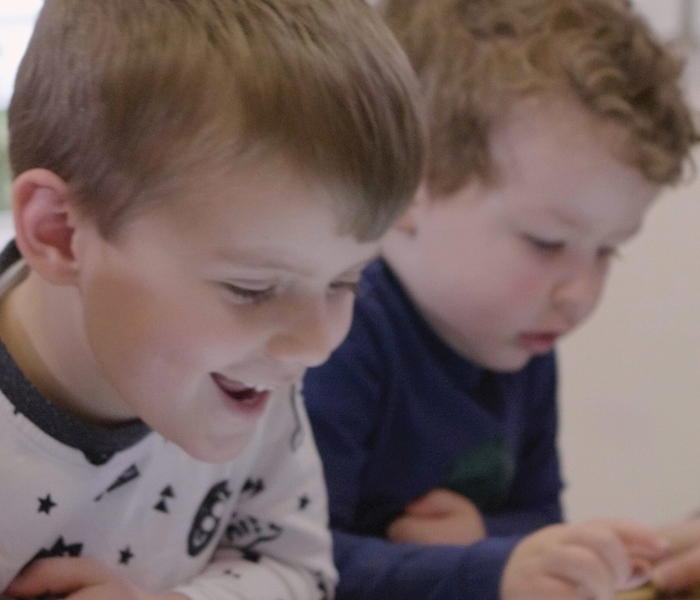 Children enjoying Sharp's touchscreen table