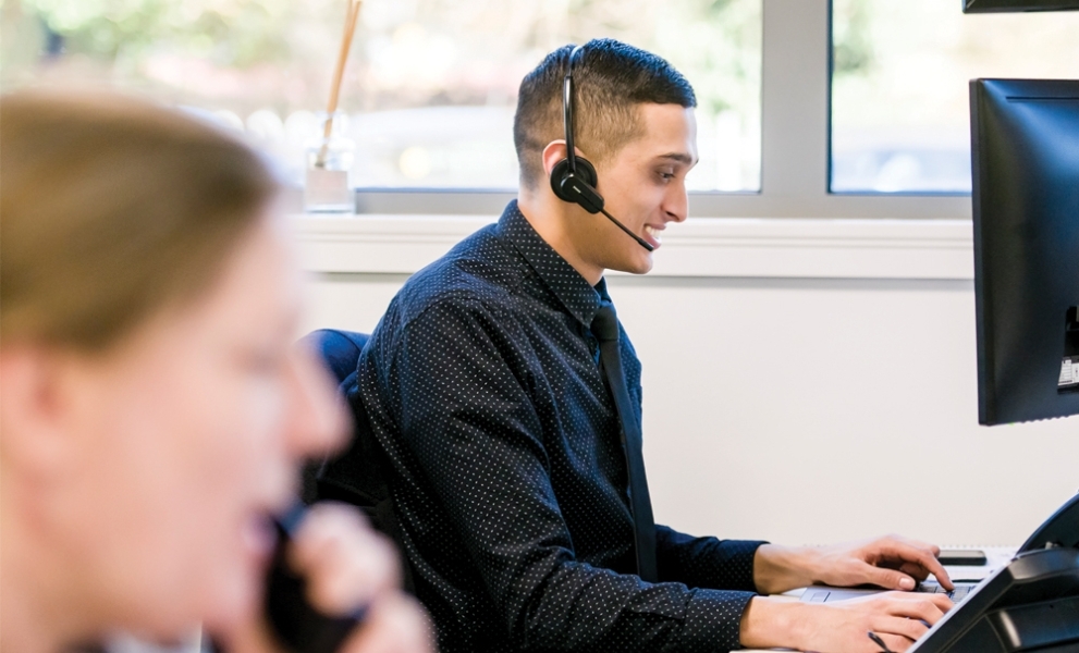 Man and woman providing remote IT Support