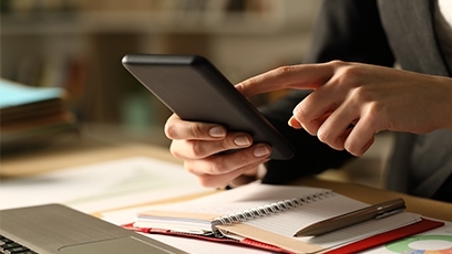 Person typing on a phone